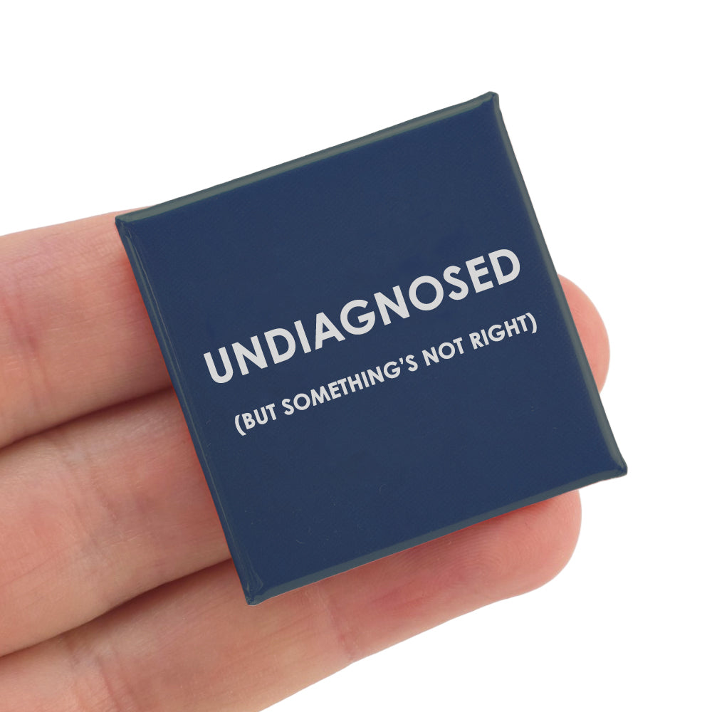 Undiagnosed but something's not right...| 38mm Square Pin Badge | Cracker Filler